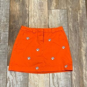Orange Skirt with Clemson Tiger Paw Print Design with purple outline.
